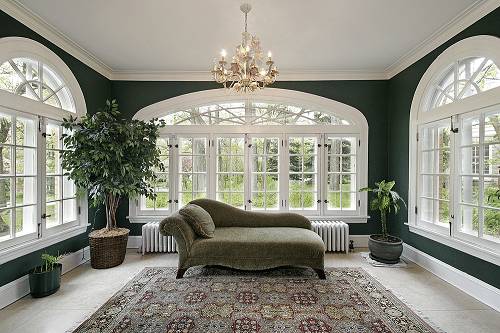 verona living room windows and green sofa